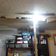 Technicians performing water removal and surface sanitizing
